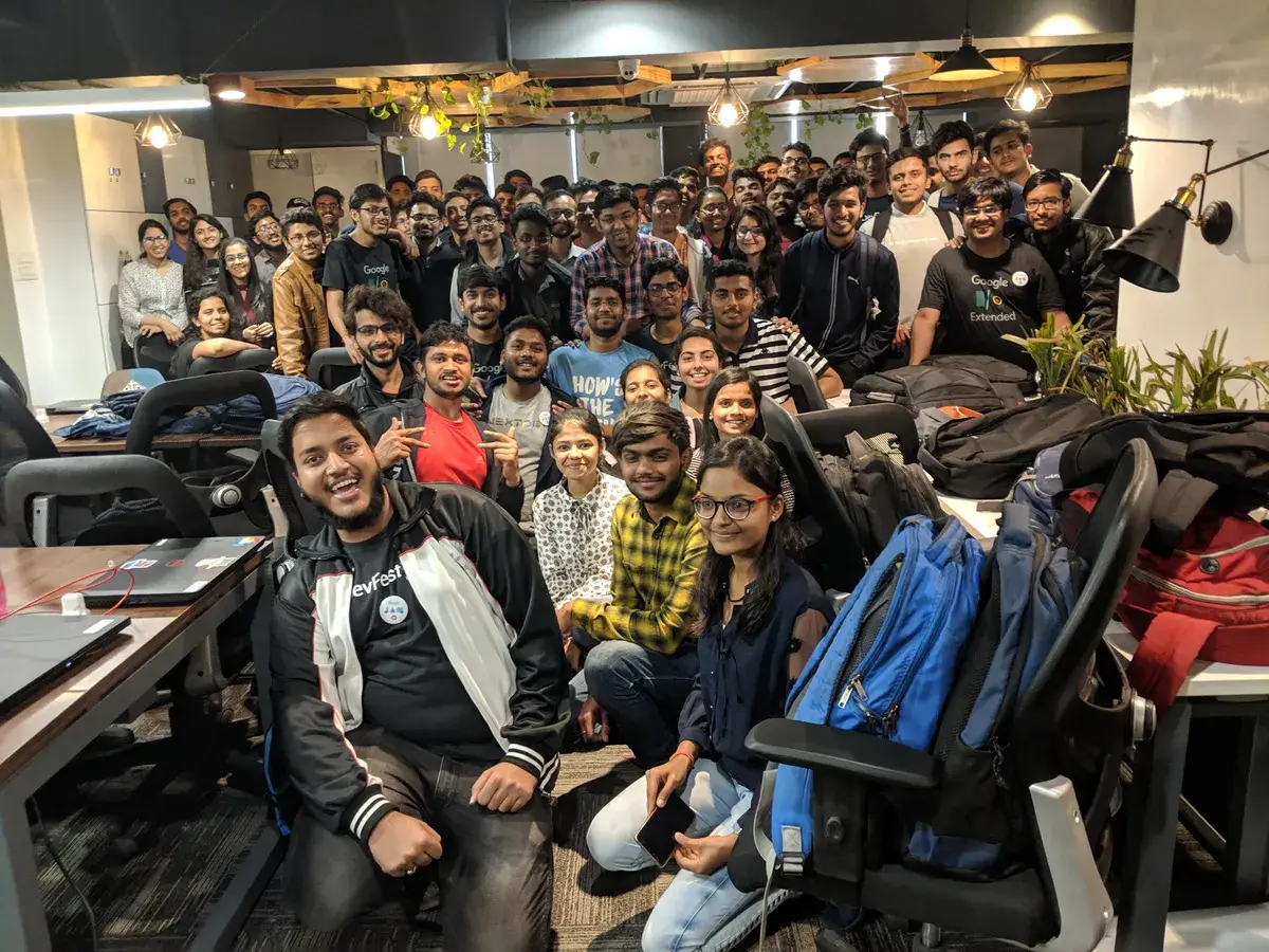 Adeen with a room full of developers at a 2019 community event