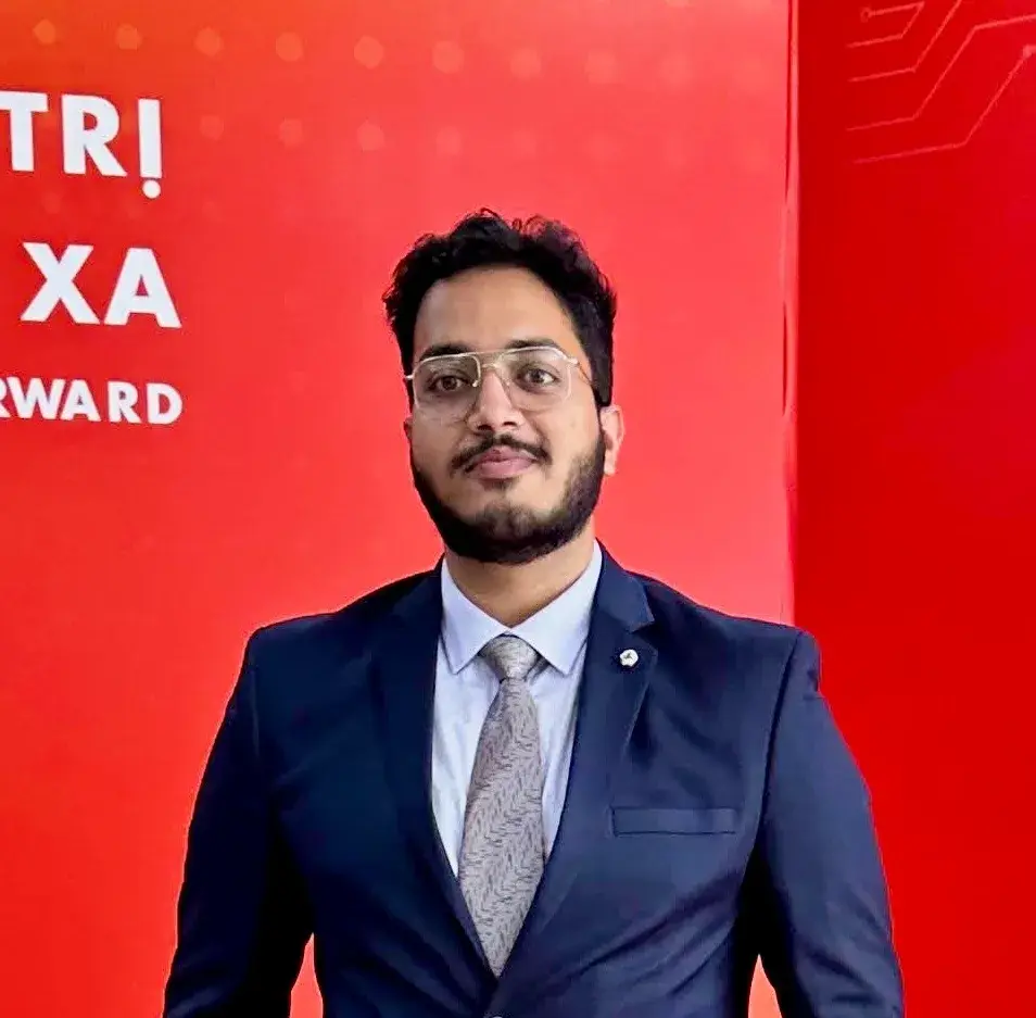 Adeen Shukla in a suit